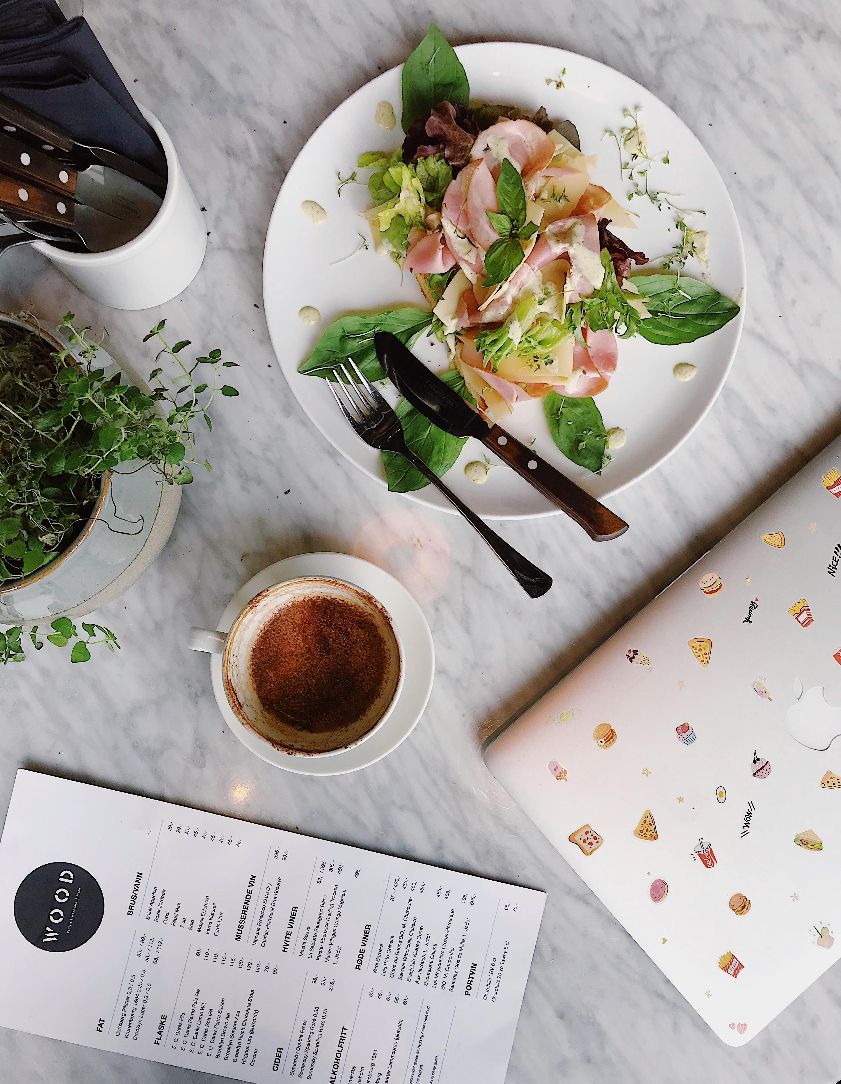 Restaurant staff using digital POS system to manage orders and inventory